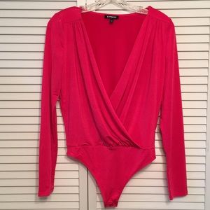 Express long sleeved, thong body suit.